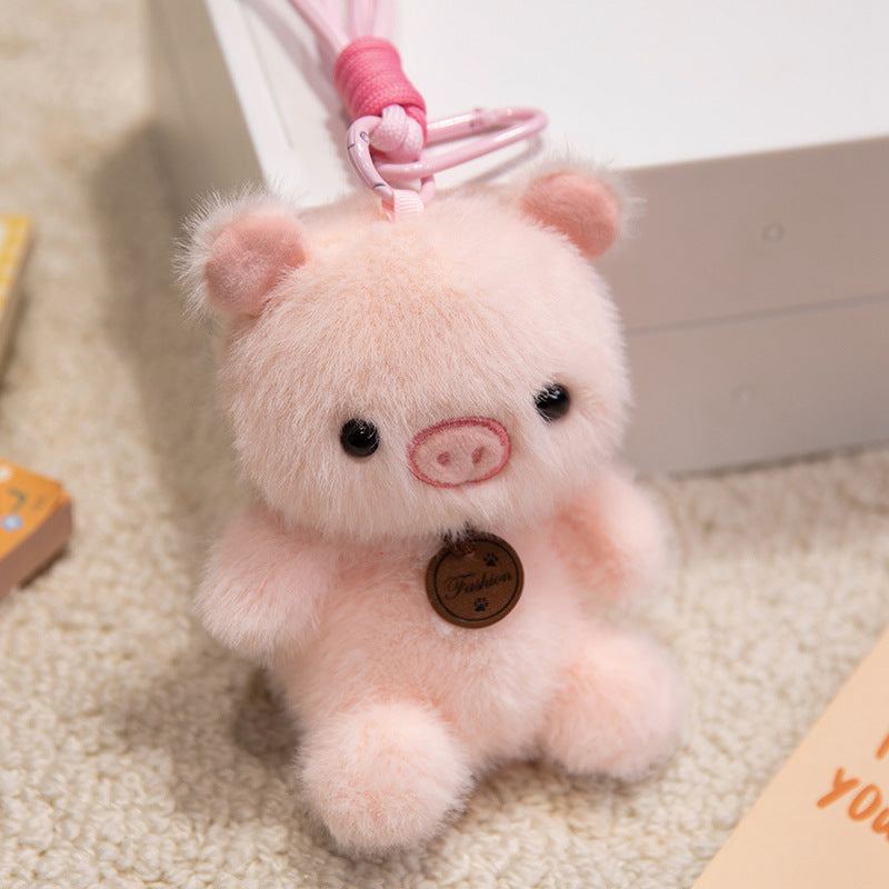 Plush Sitting Piglet Comforter Toy with Embroidered Paw Charm and Pendant Stornfield
