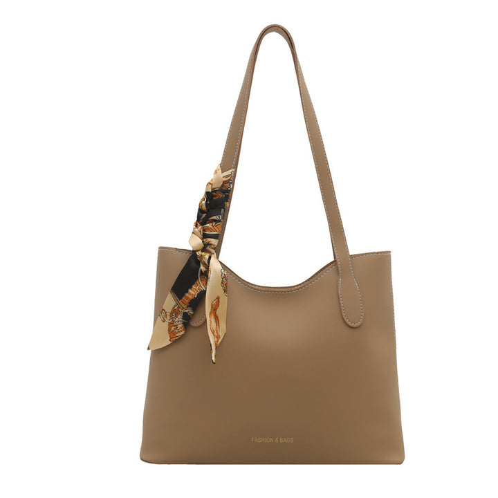 Elegant Structured Tote Handbag with Decorative Scarf