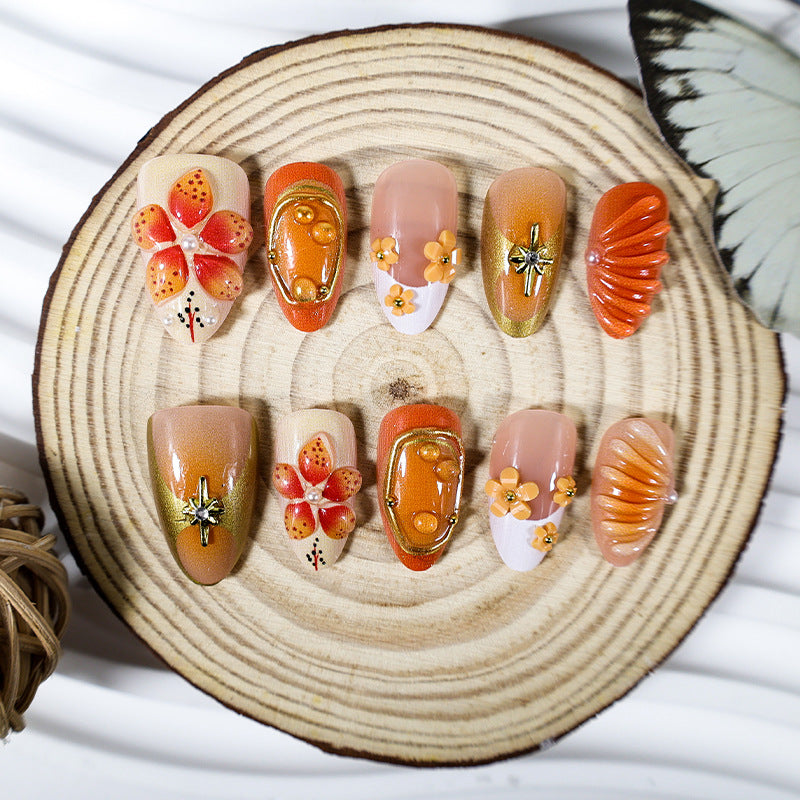 Acrylic nail set with cheerful flower and glitter details Stornfield