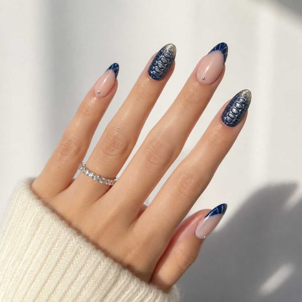 Artificial nails with elegant tip decoration and decorative accents Stornfield