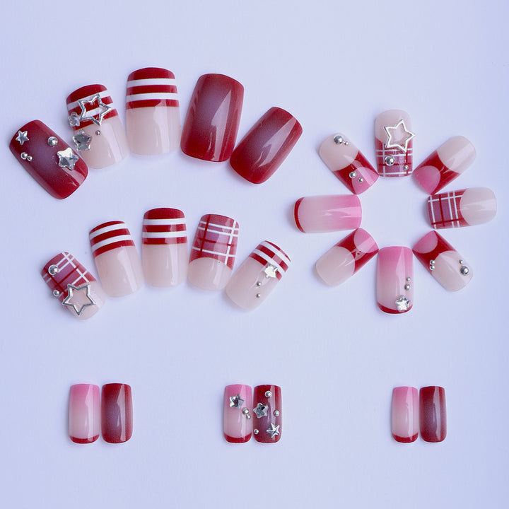 Artificial fingernails with handcrafted star decorations Stornfield