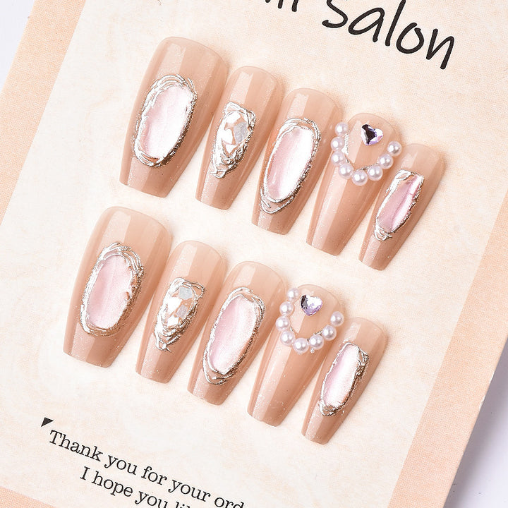 Artistic Press-On Nail Design with Elegant Metallic Accents