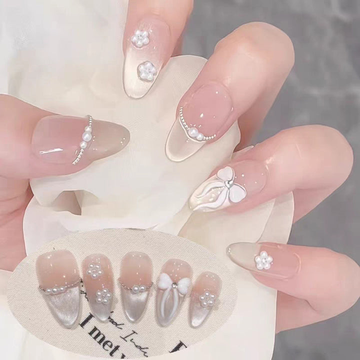 Artificial nails with elegant, adorned tips Stornfield