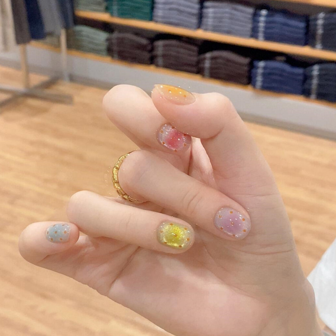 Glittering artificial nail tips in cheerful design Stornfield