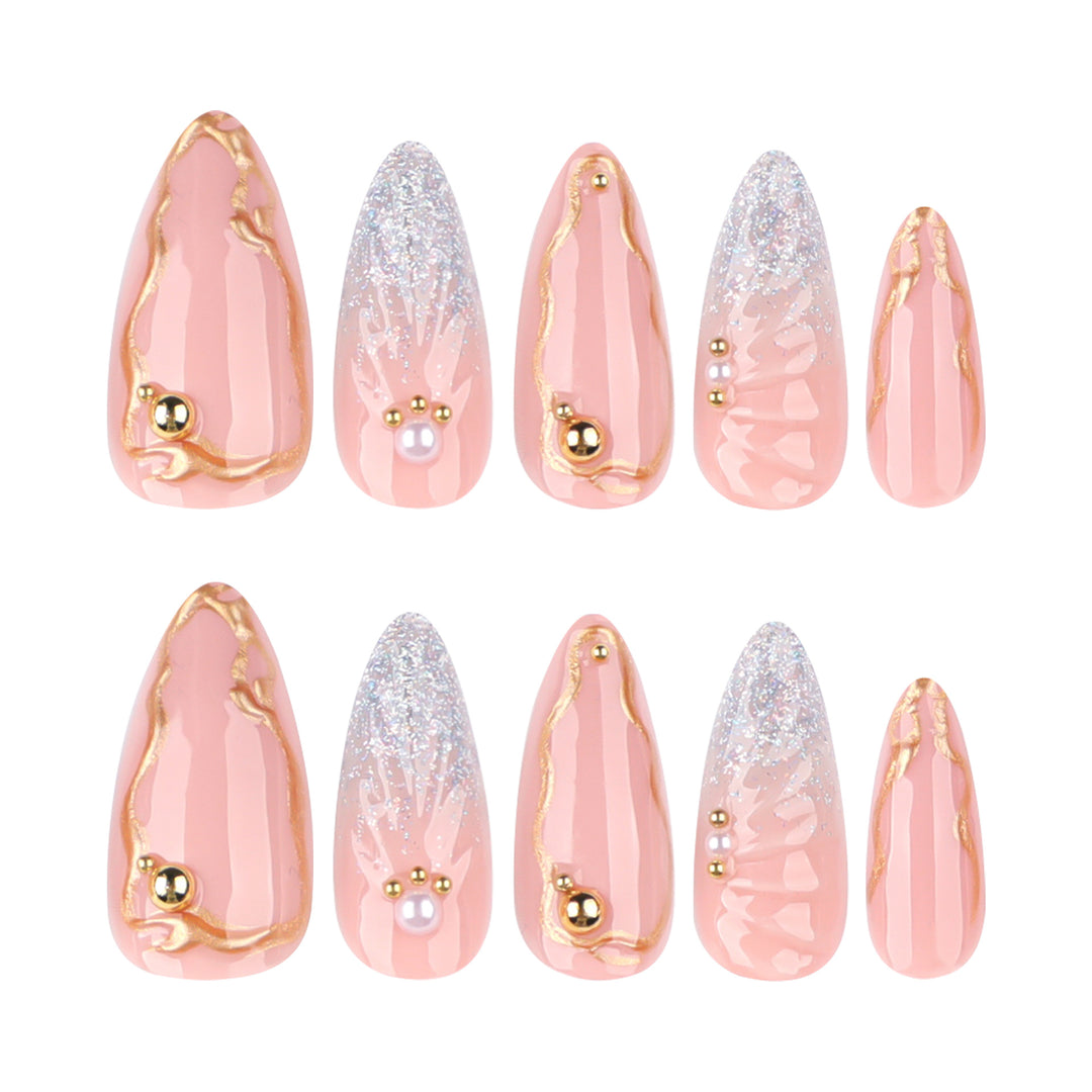 Artful stiletto nails with elegant gold embellishment design Stornfield