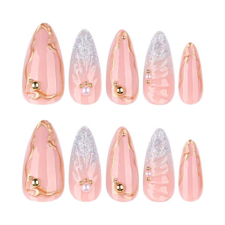Artful stiletto nails with elegant gold embellishment design Stornfield