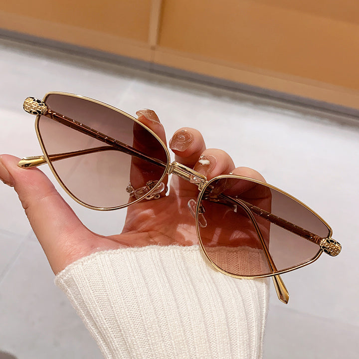 Ladies Designer Sunglasses with Chic Cat Eye Design and Luxurious Frame Stornfield