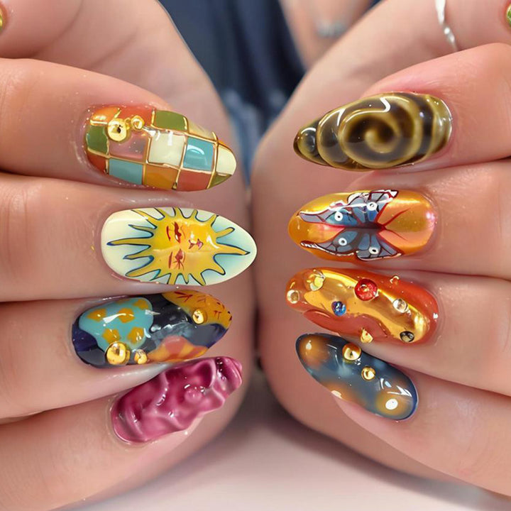 Acrylic nail set with creative summer motifs and sparkling accents Stornfield