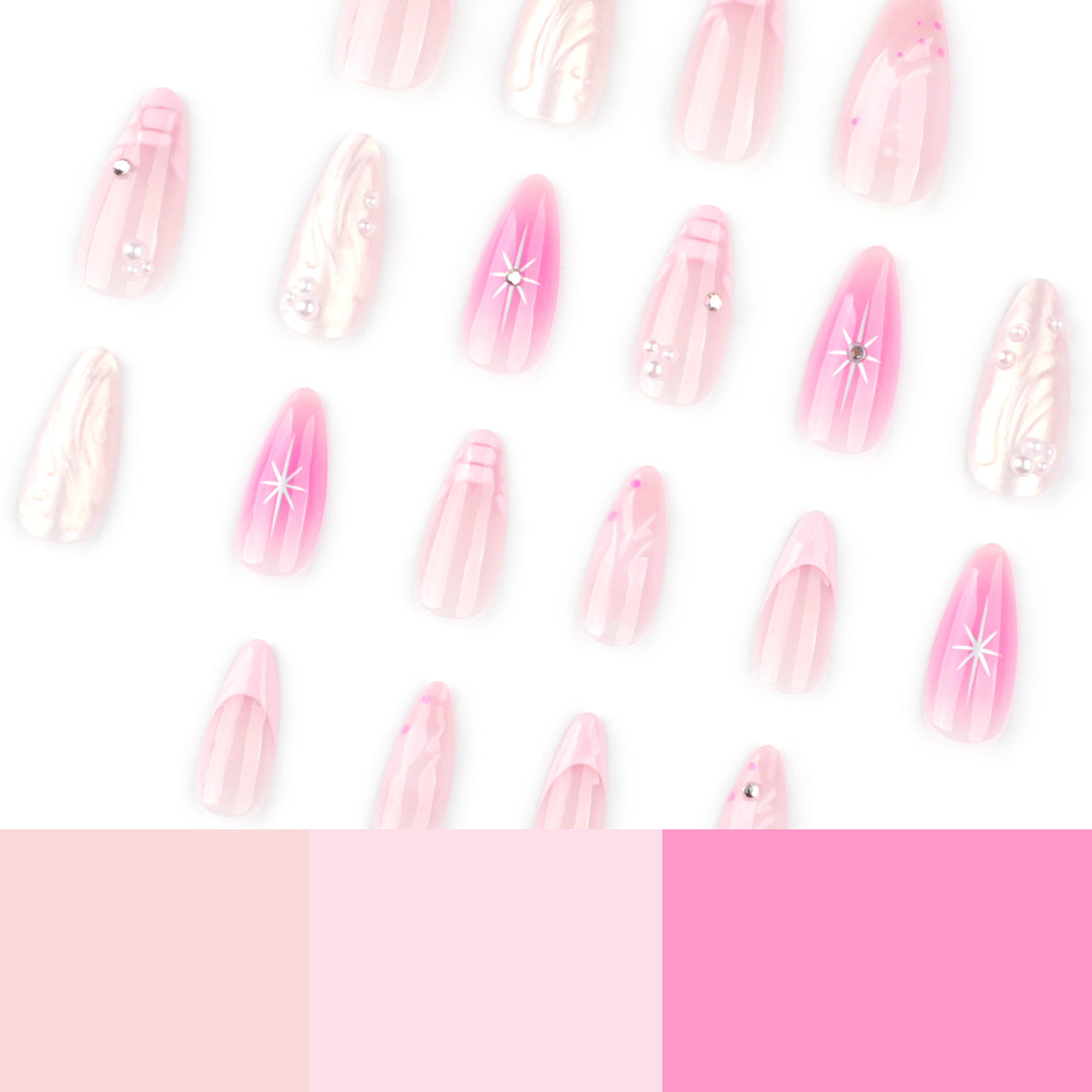 Artful Nail Extensions with Glitter and Shell Motifs Stornfield