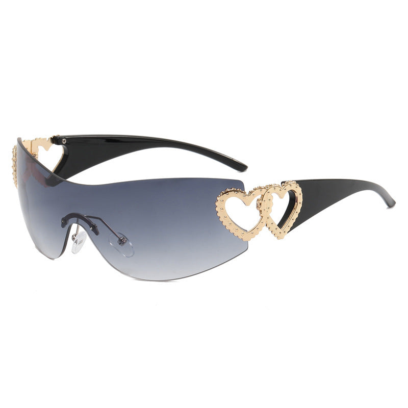 Ladies sporty sunglasses in trendy shield design with heart accents Stornfield
