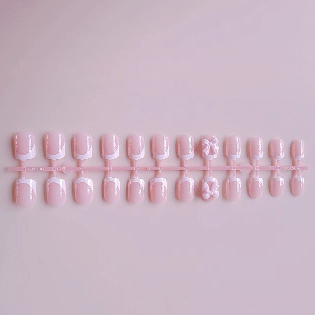 Acrylic Nail Set with Elegant Tips and 3D Bow Decorations Stornfield