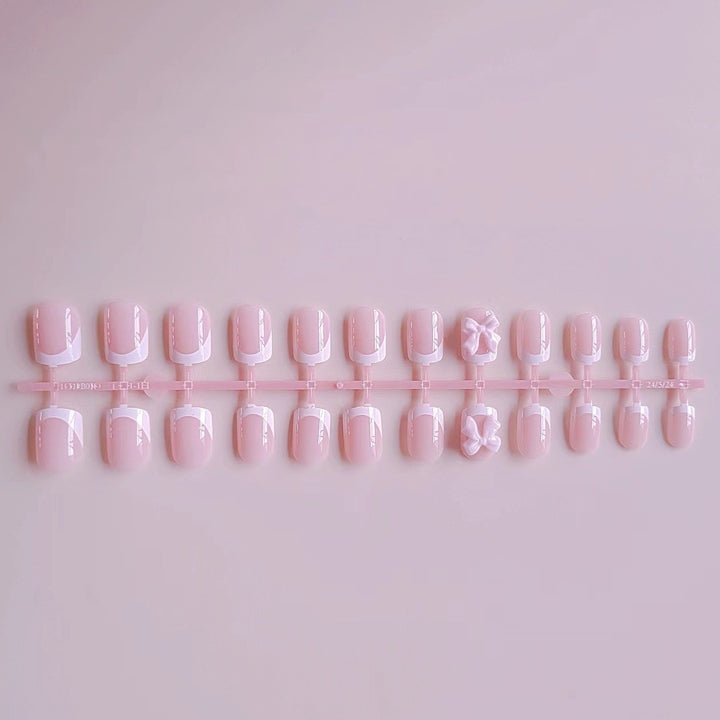 Acrylic Nail Set with Elegant Tips and 3D Bow Decorations Stornfield