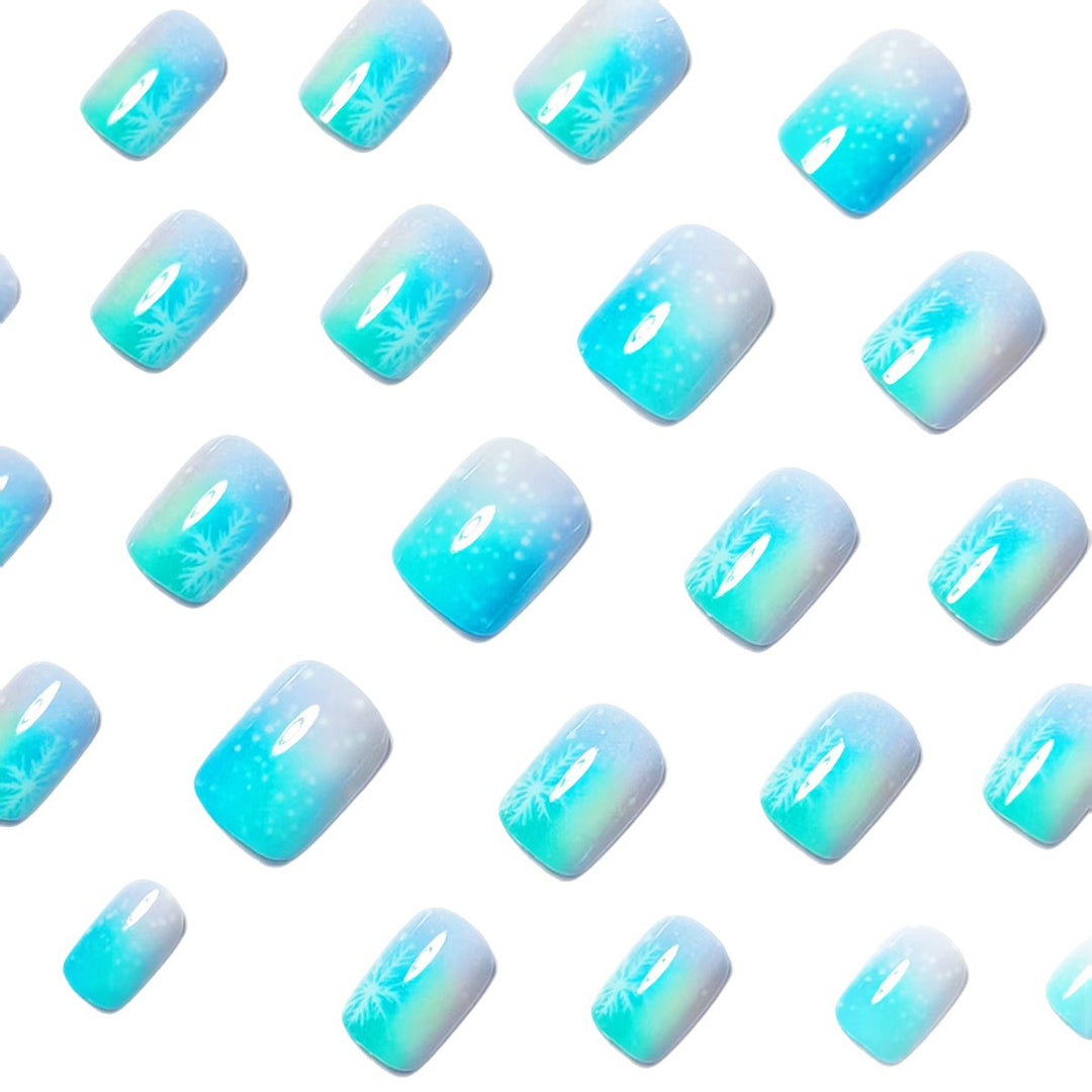 Wintry Artistic Nails with Shimmering Snowflake Design Stornfield