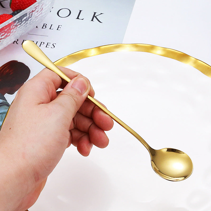 Elegant teaspoon with polished gold surface Stornfield