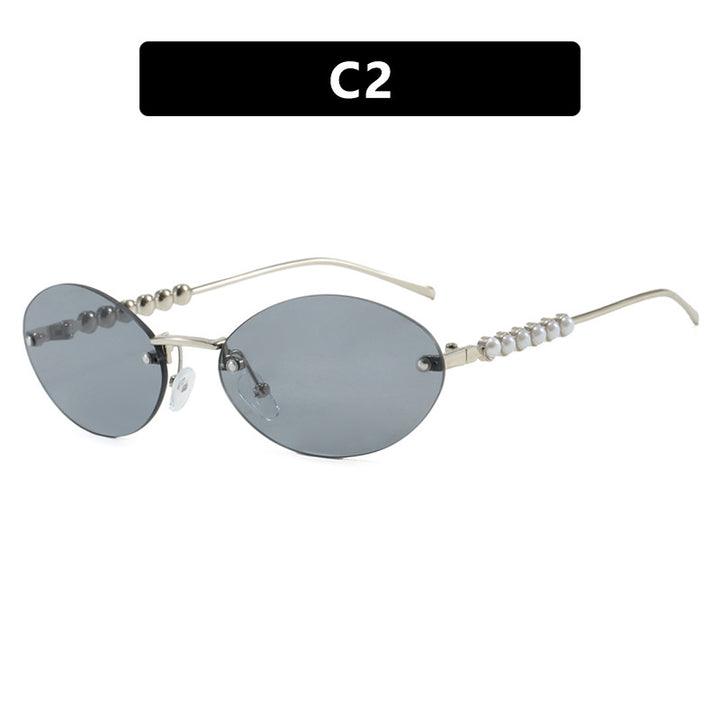 Women's stylish oval sunglasses with elegant embellishments Stornfield