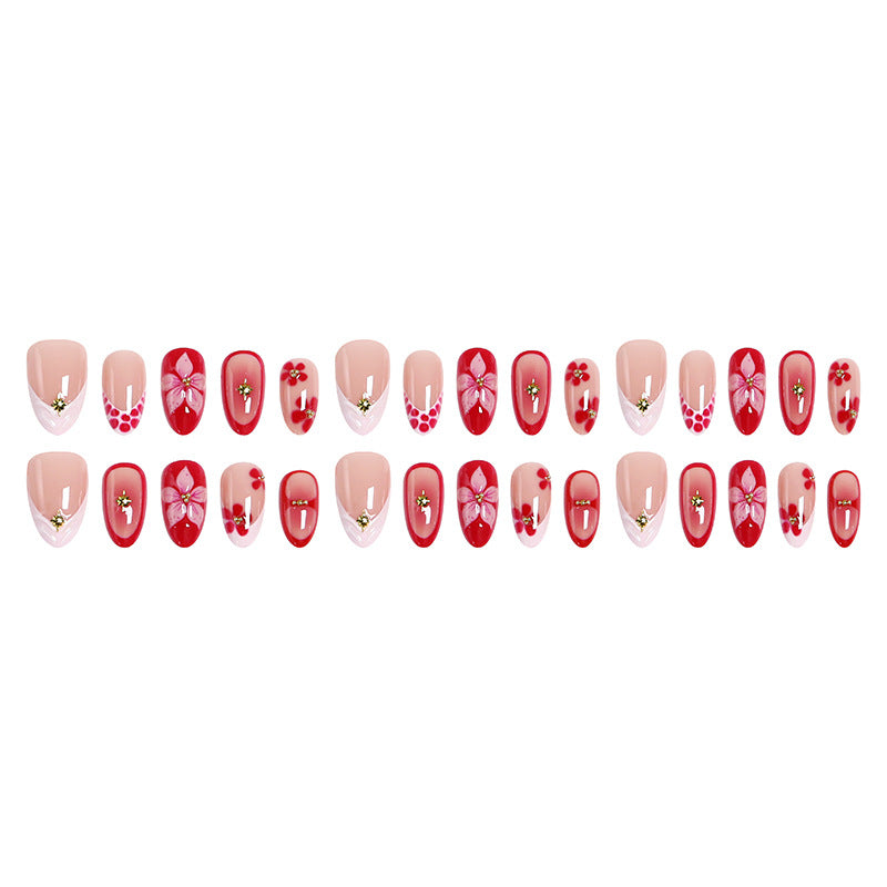 Artificial nails with floral design and glamorous accents Stornfield
