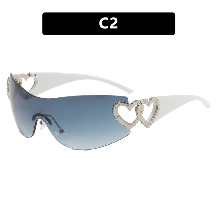 Ladies sporty sunglasses in trendy shield design with heart accents Stornfield