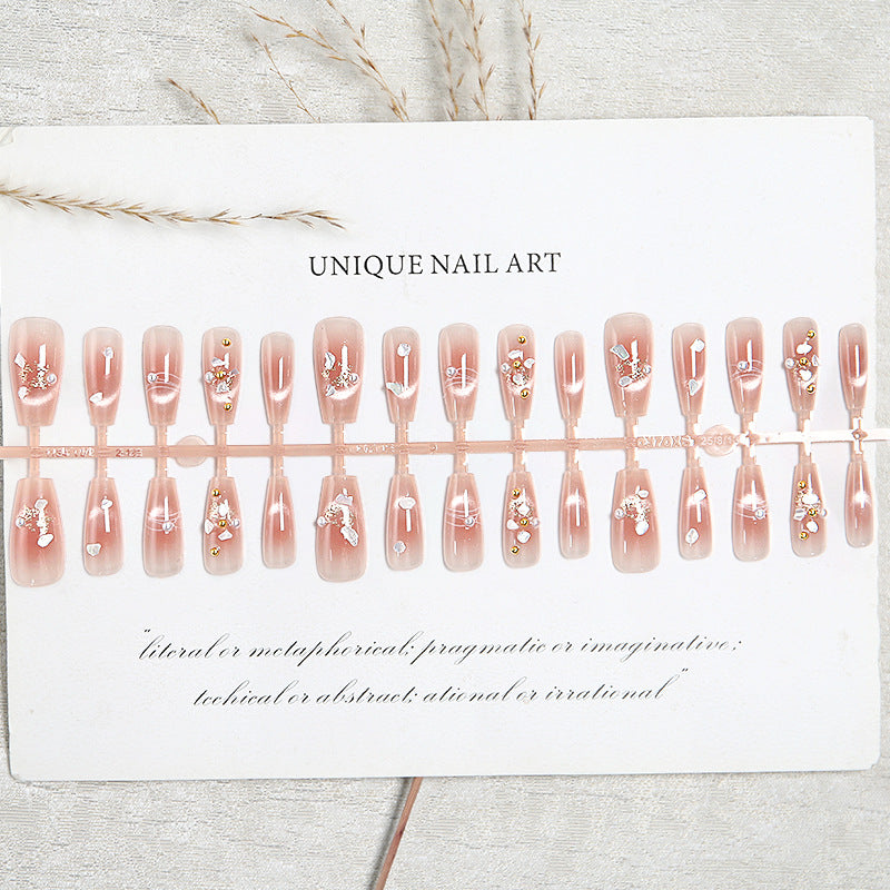 Artificial nail set with elegant glitter and flower decorations Stornfield