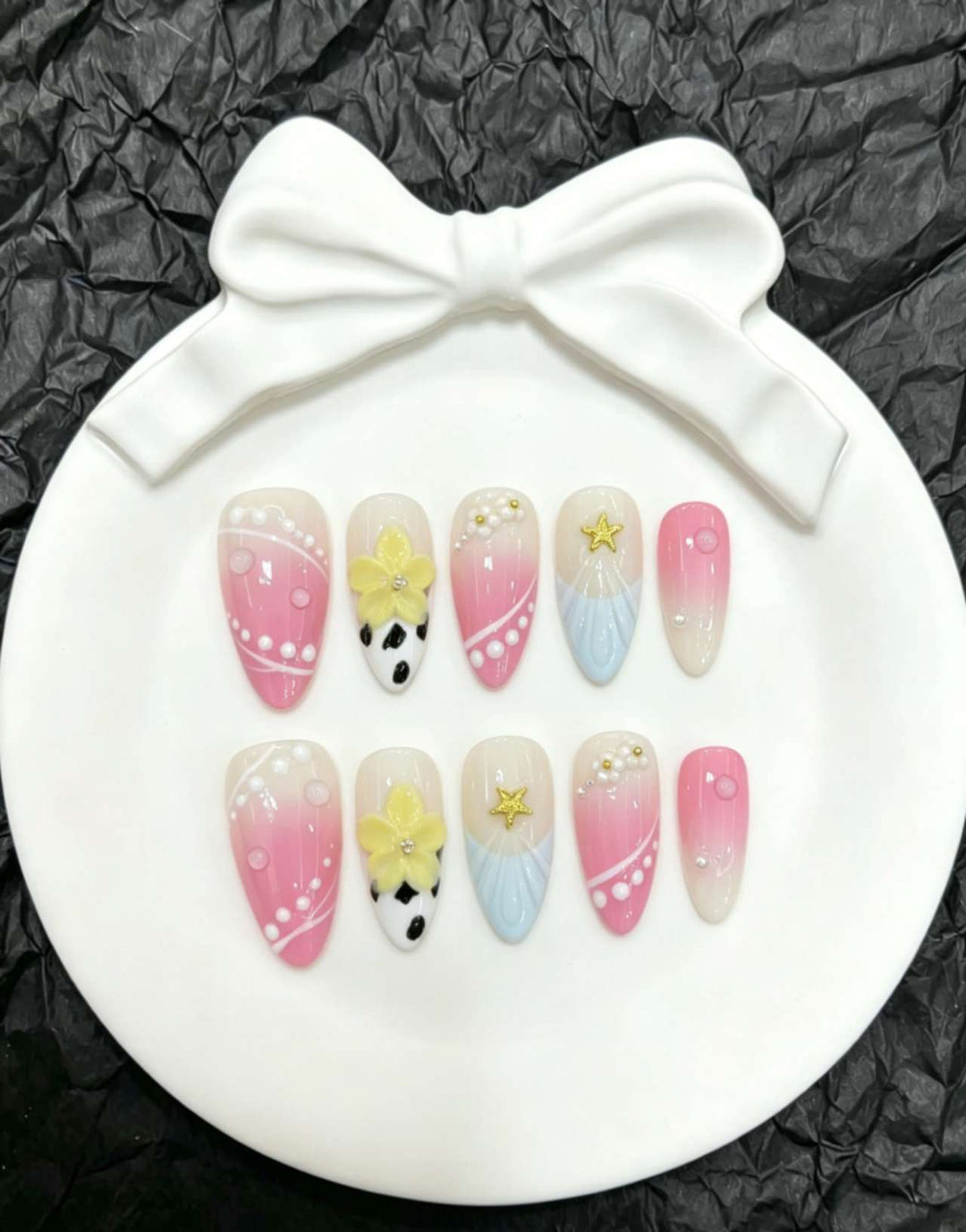 Decorative Press-On Nail Art Set with Floral and Whimsical Designs