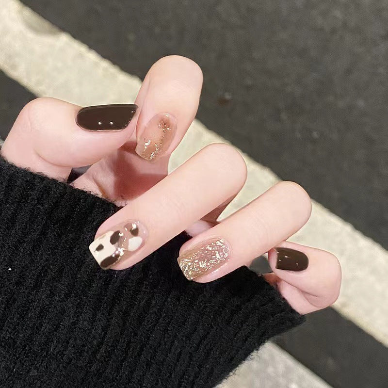 Artistic acrylic nails with modern animal design Stornfield