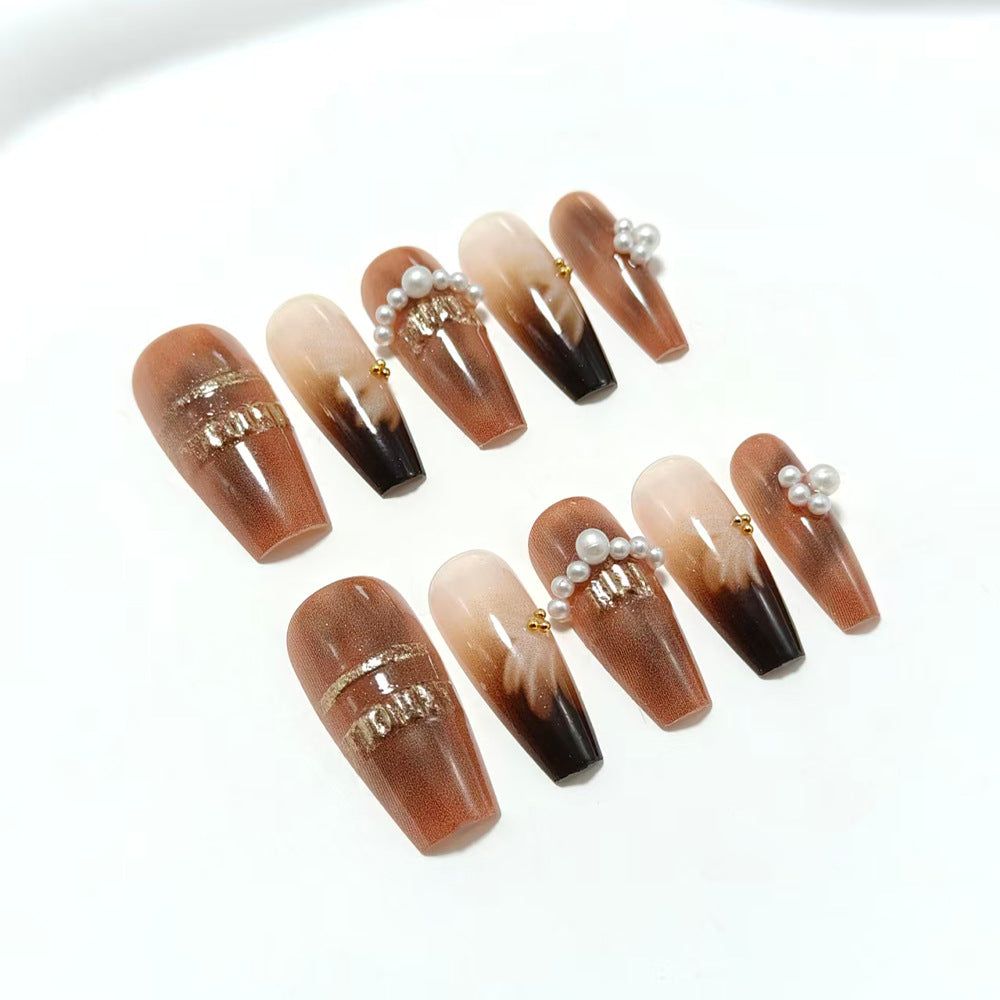 Artificial nails with elegant pearl and gold accents Stornfield