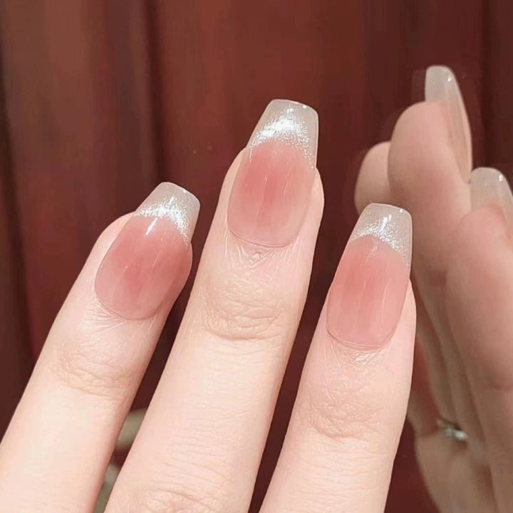 Nail set with elegant French design and sparkling accents Stornfield