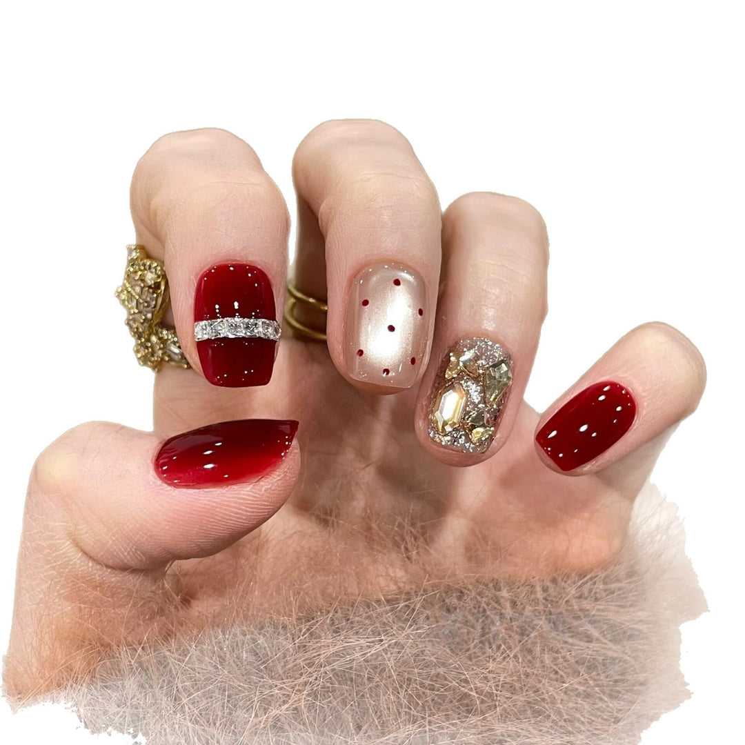 Glamorous artificial nails with sparkling rhinestones Stornfield