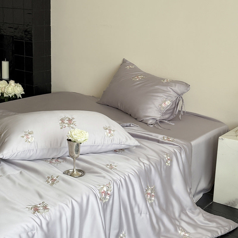 Luxurious satin bedding set with delicate rose embroidery Stornfield