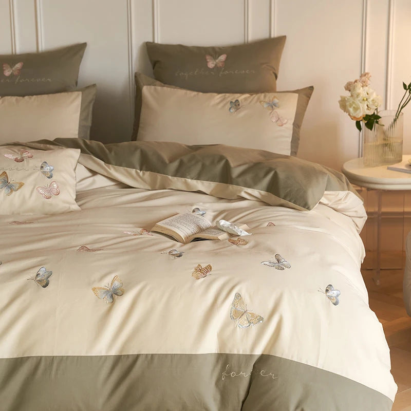 Reversible duvet cover set made of cotton satin with fine butterfly embroidery