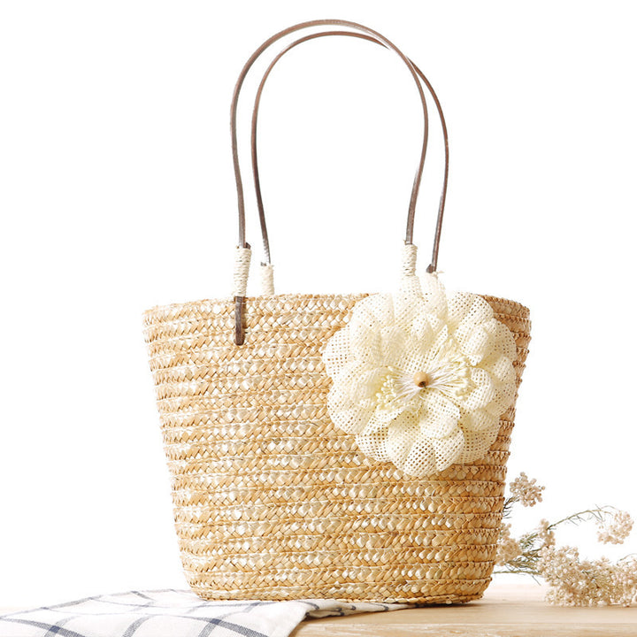 Elegant bast bag with flower appliqué Stornfield