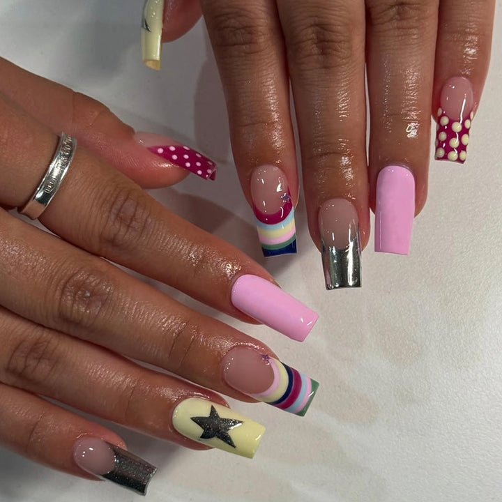 Artificial nails with creative designs and 3D accents Stornfield