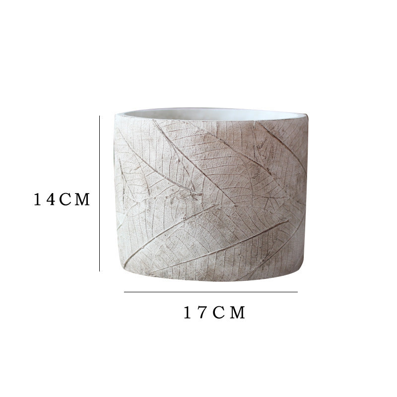Decorative plant container made of handmade ceramic with leaf pattern Stornfield