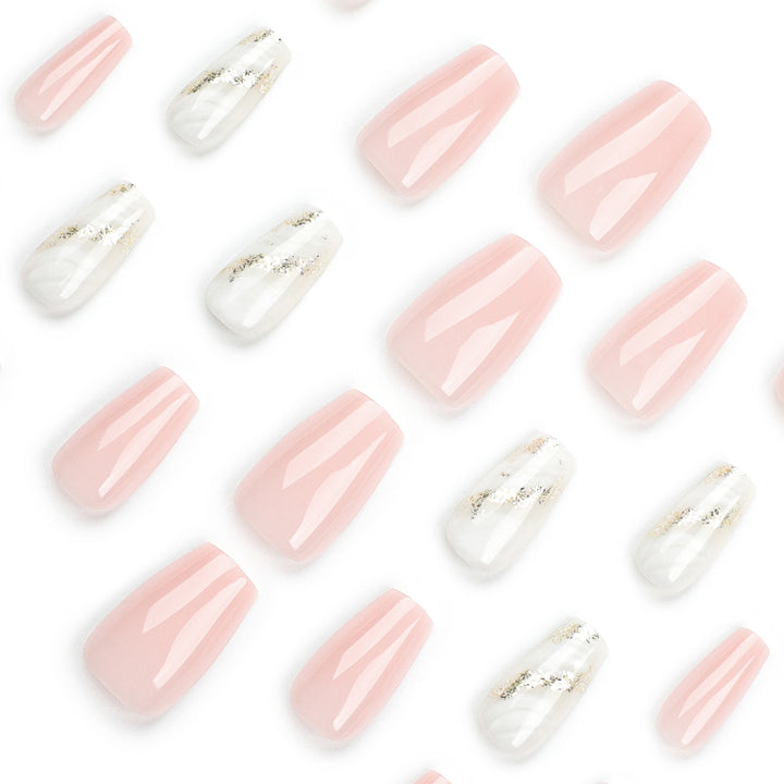 Artistic Nail Extensions with Elegant Gold Design Stornfield