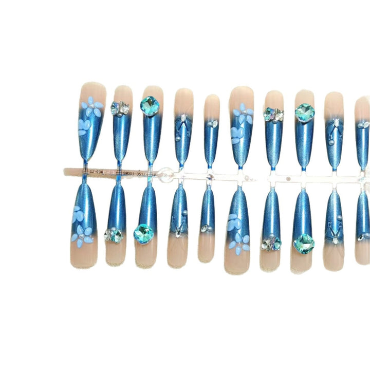 Elegant artificial nails with floral applications and glitter elements Stornfield