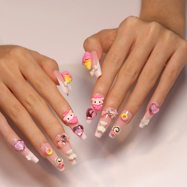 Artful nail extensions with 3D dessert motif Stornfield