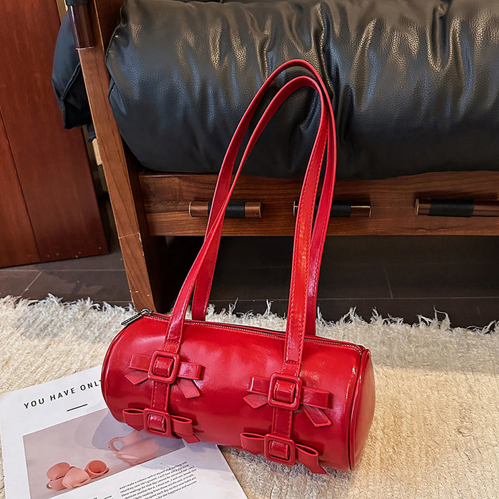 Bow-Accent Barrel Bag