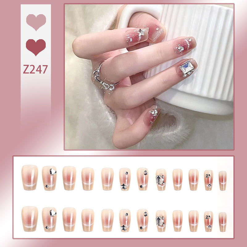 Artificial nail set with elegant glitter and star decorations Stornfield