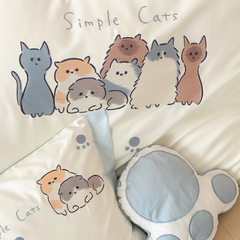 Playful children’s and youth bedding set with cartoon cats, microfiber, reversible function and paw print design