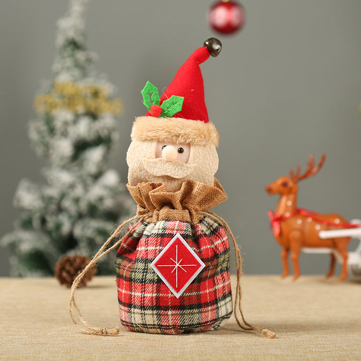 Cute Christmas gnome with gift sack Stornfield