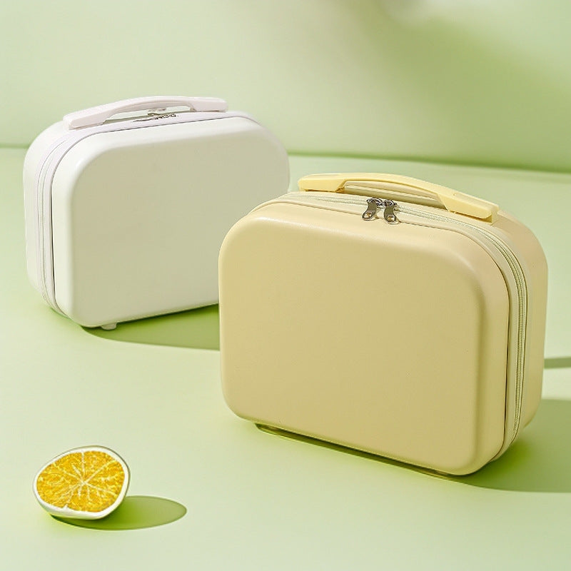 hard-shell travel vanity case with molded handle and double-zip closure Stornfield