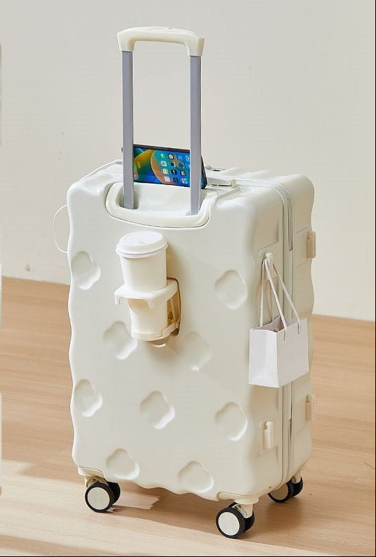 hard-shell carry-on suitcase with integrated foldable cup holder phone cradle USB charging port and external bag hooks Stornfield