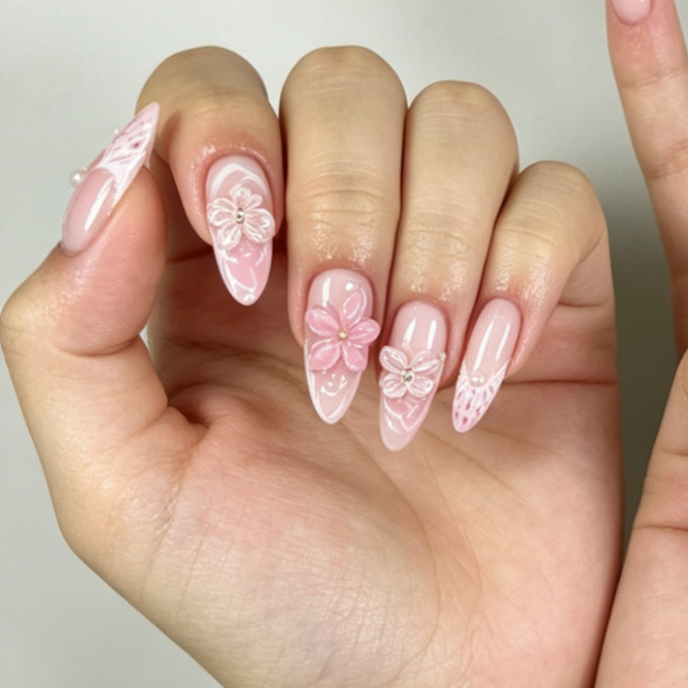 Artificial nails with romantic flower and butterfly accents Stornfield