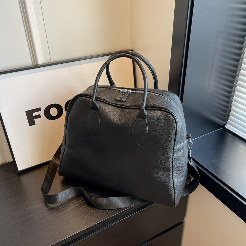 Stylish and Spacious Travel Bag with Versatile Carrying Options Stornfield