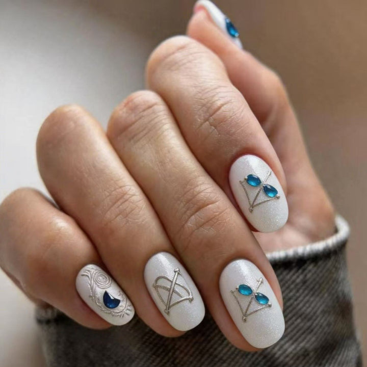 Artificial nails with noble glitter accents and symbol motif Stornfield