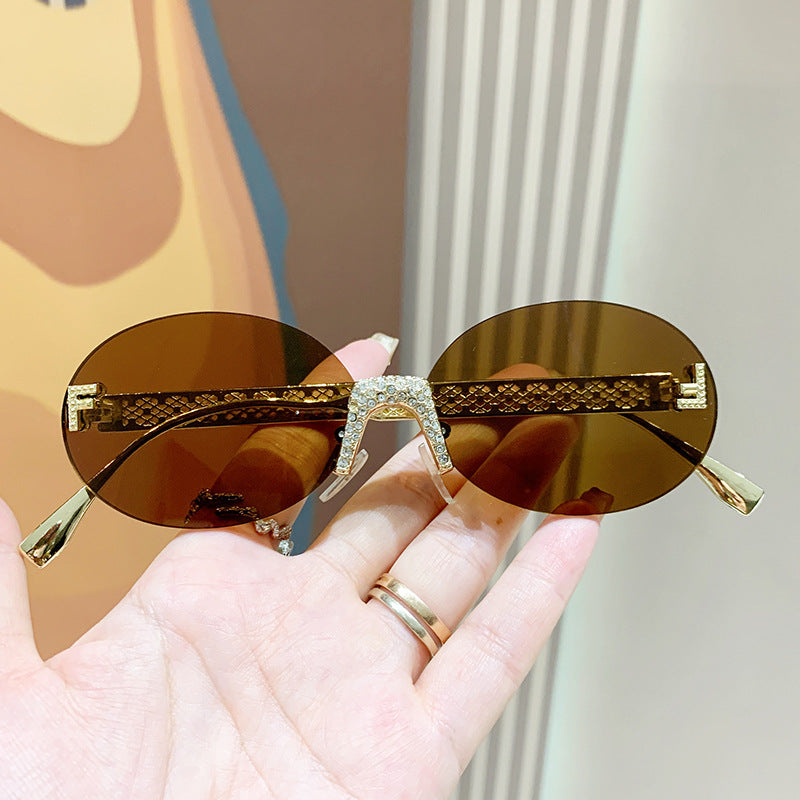 Women's sunglasses with glittering frame and oval lenses Stornfield