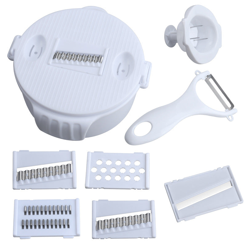Multifunctional vegetable slicer with integrated cutting attachments Stornfield