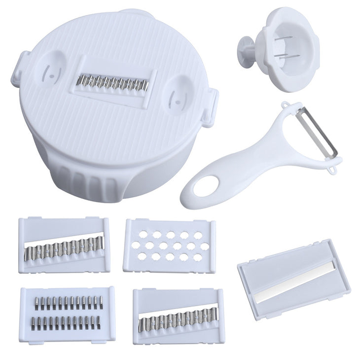 Multifunctional vegetable slicer with integrated cutting attachments Stornfield
