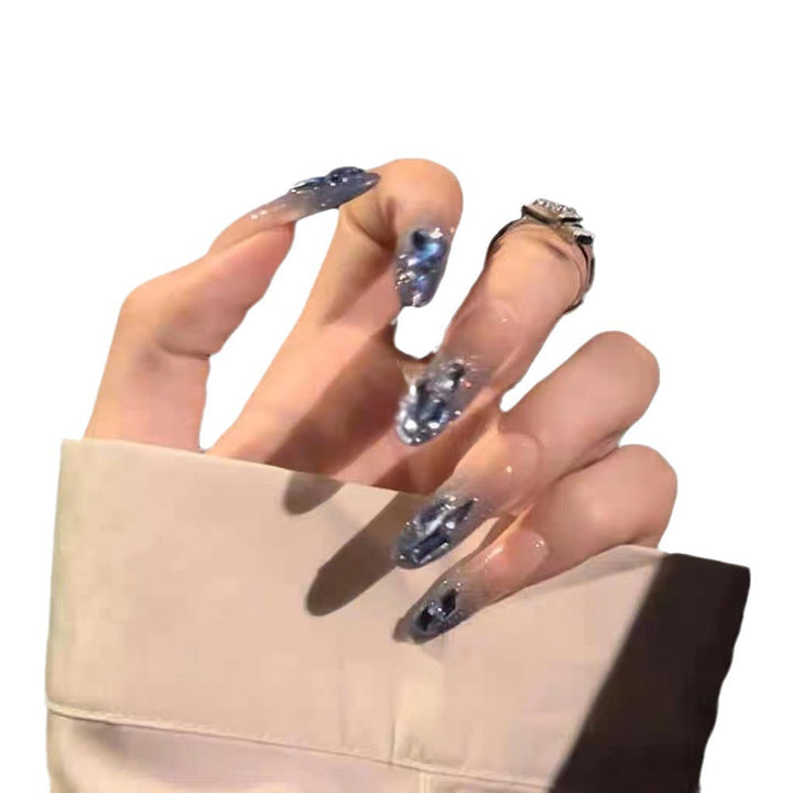 Artificial nails in creative moon and star design Stornfield