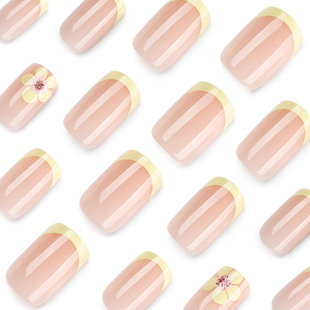 Artistic French-tip nails with floral decorations Stornfield