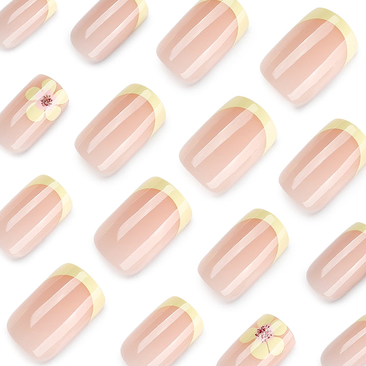 Artistic French-tip nails with floral decorations Stornfield